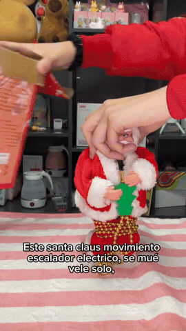 Papá Noel escalador funcionando